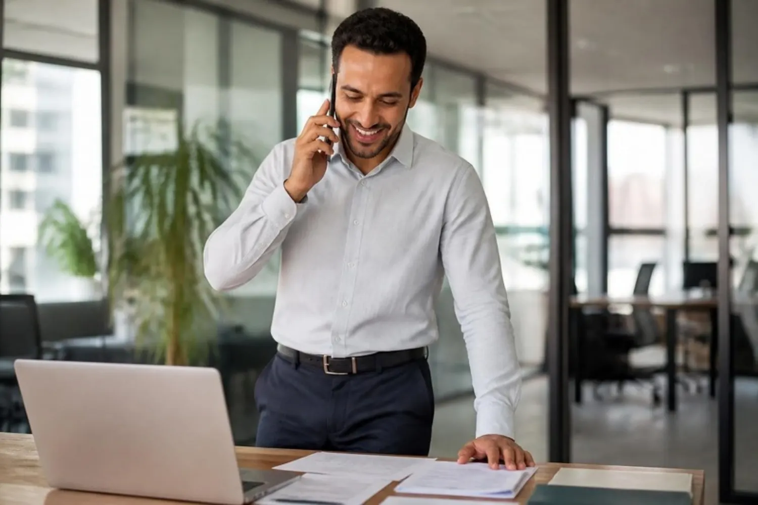 A purchasing manager on a call with a supplier